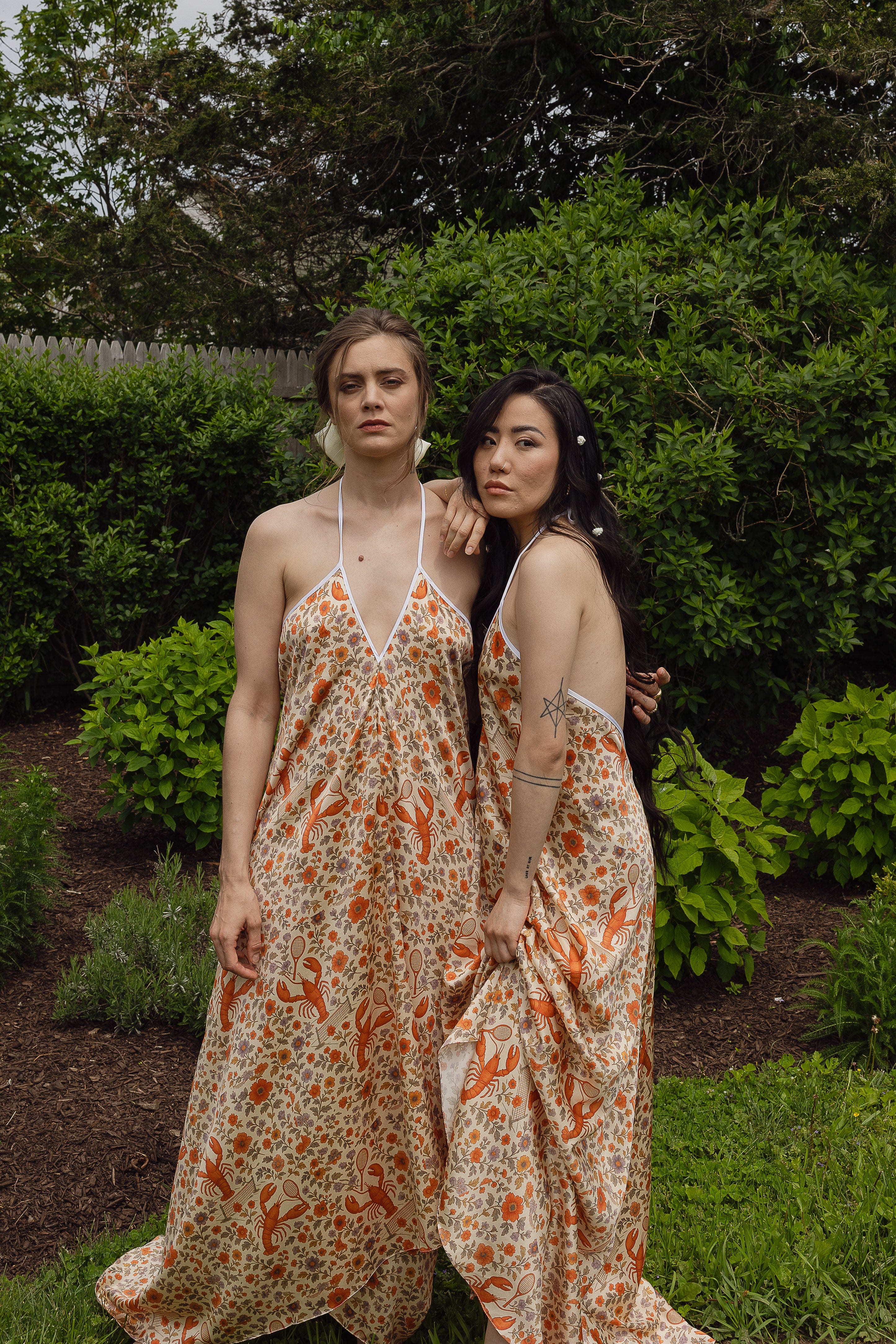 The Lobster Serve Dress in 100% silk with a tennis print, detail view