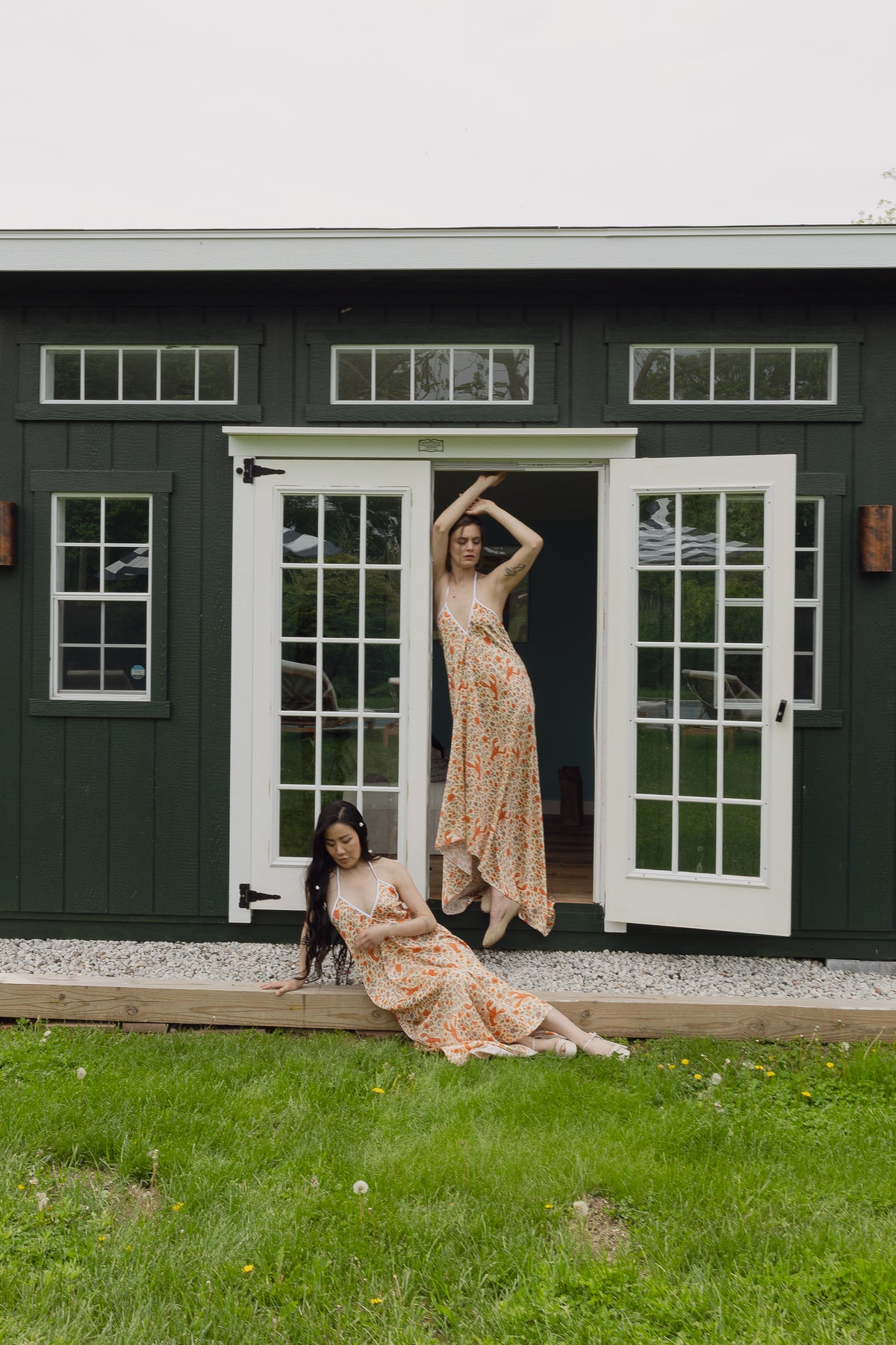 The Lobster Serve Dress in 100% silk with a tennis print, styled in studio