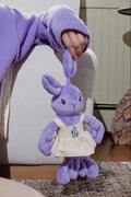 The Lavender Lobster plush toy in a linen dress with LL logo, front view