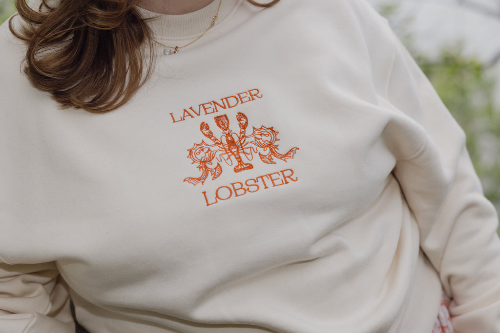 The Lobster Crew Neck in undyed organic cotton, styled shot