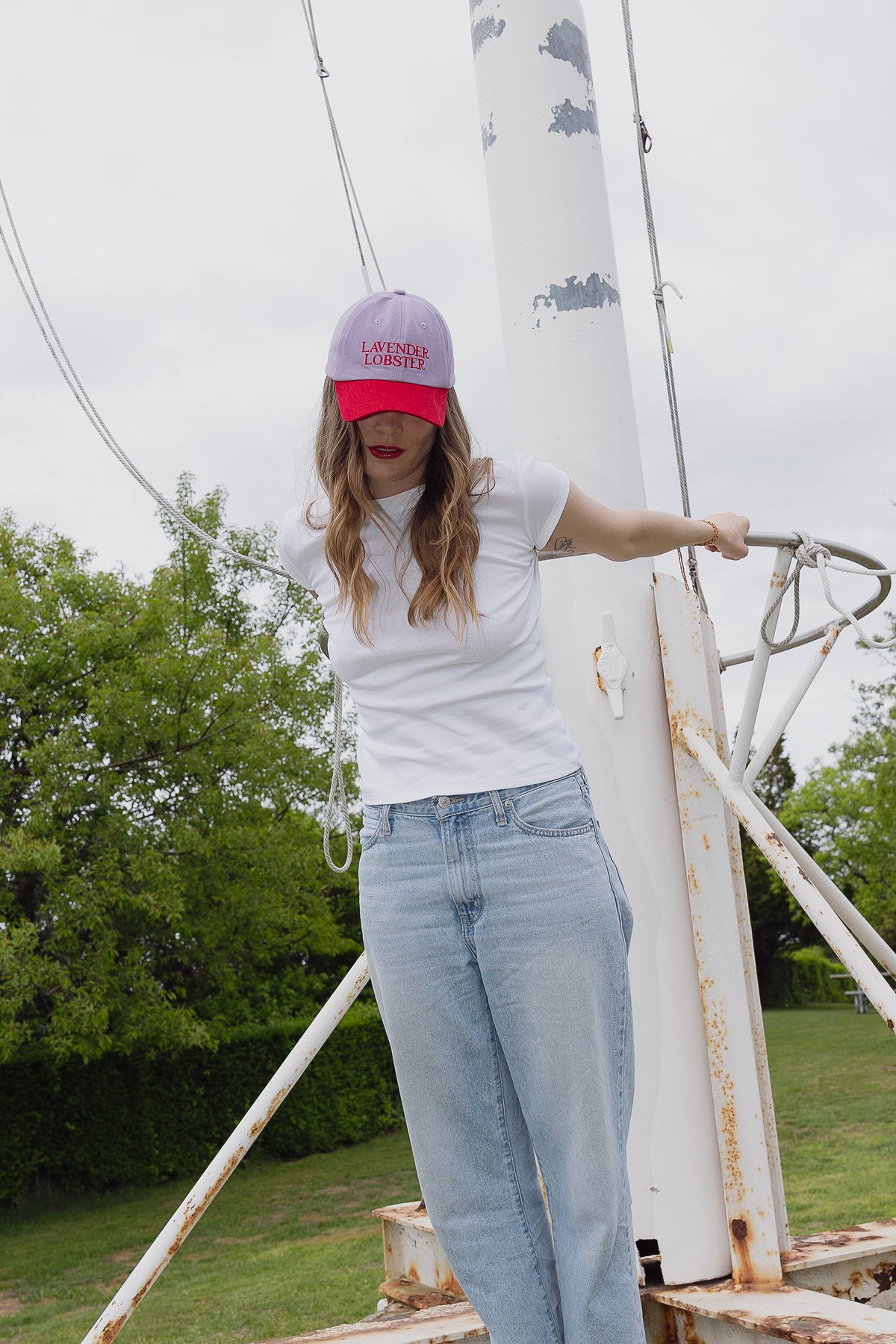 The Lobster Crew Cap in lavender and red 100% cotton, close-up detail