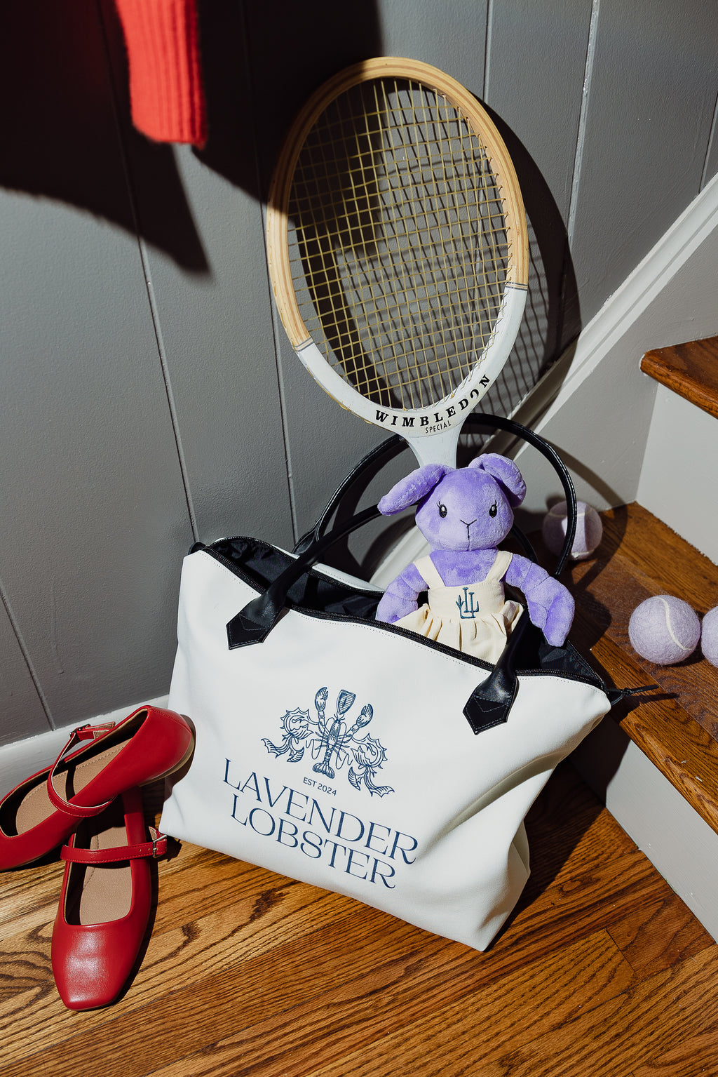 The Lobster Boat Tote in woven canvas with crest embroidery, worn shot