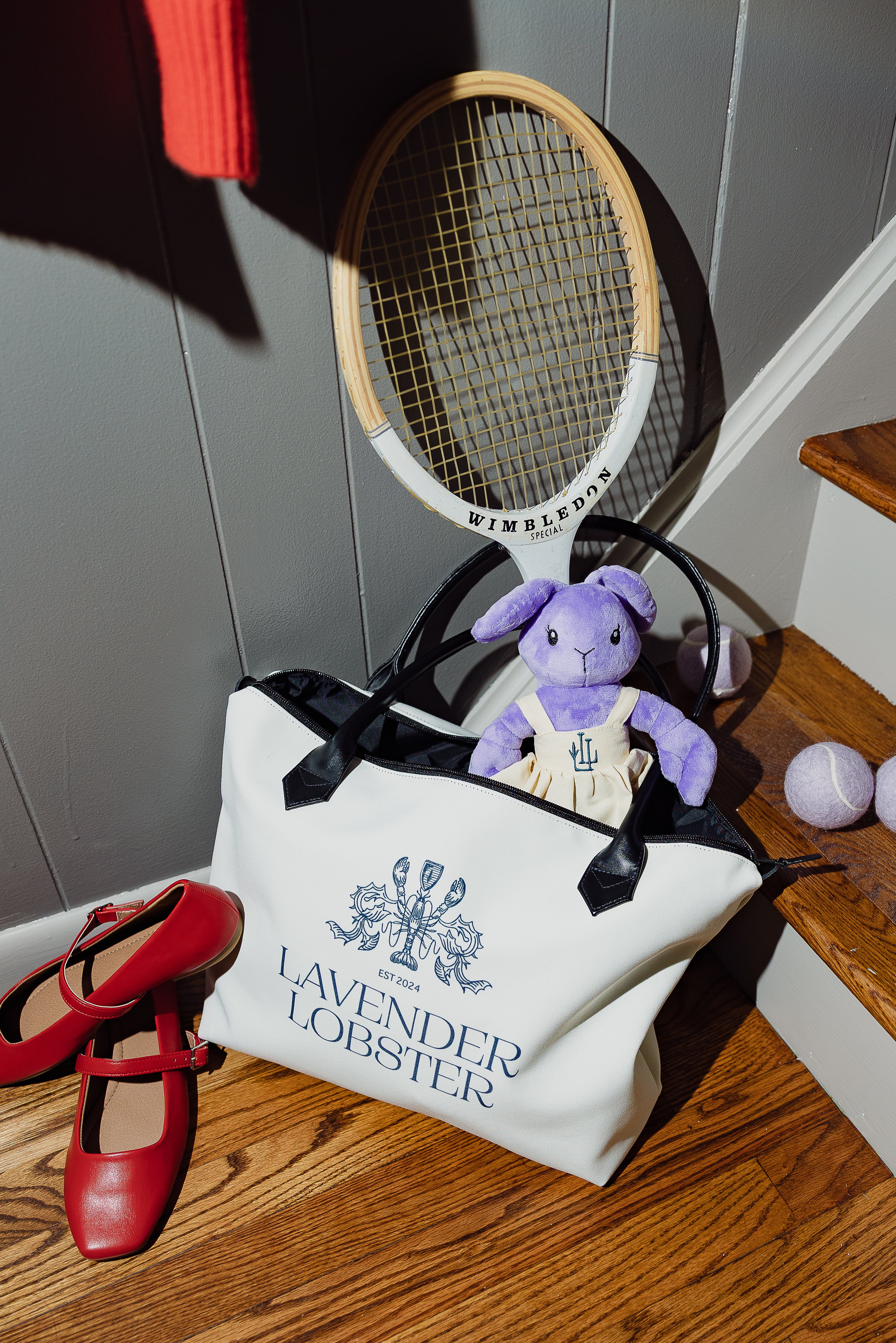 The Lobster Boat Tote in woven canvas with crest embroidery, worn shot