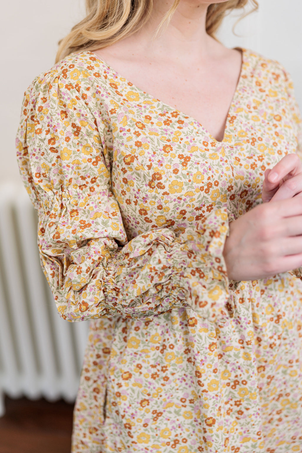 The Garden Society Dress in cotton poplin floral print, worn outdoors