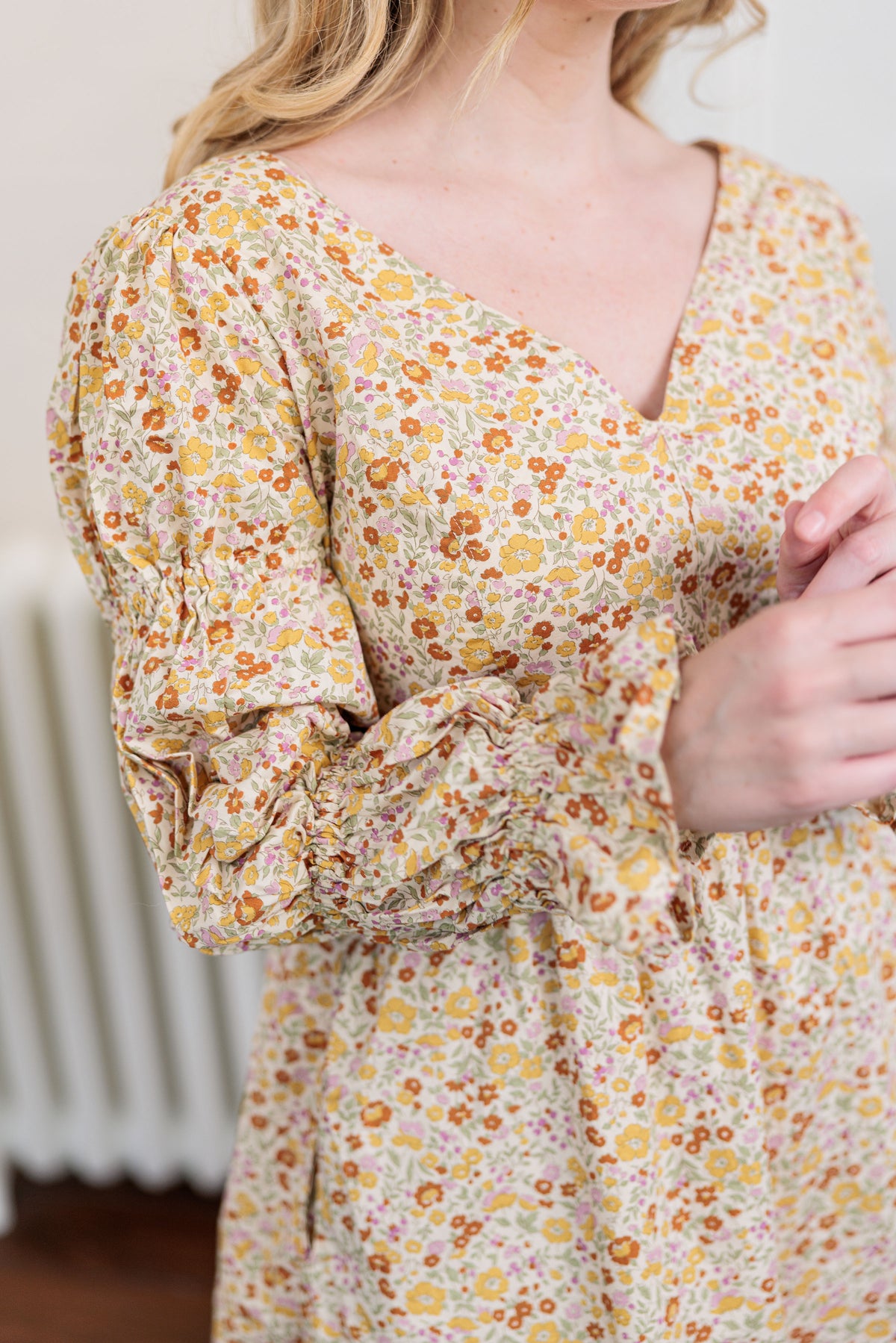 The Garden Society Dress in cotton poplin floral print, worn outdoors