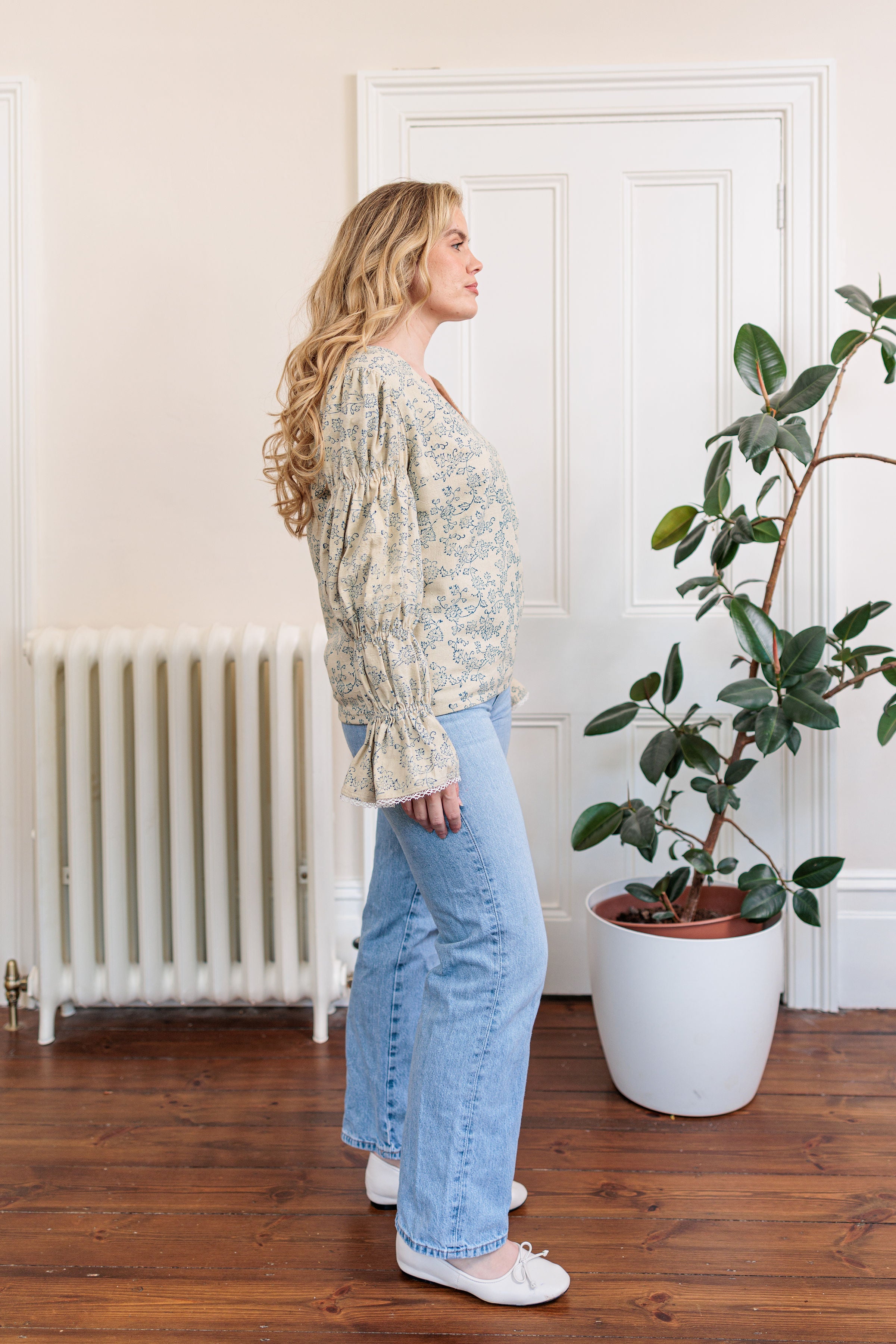 The Ledger Top in hand block printed indigo floral kala cotton, worn outdoors