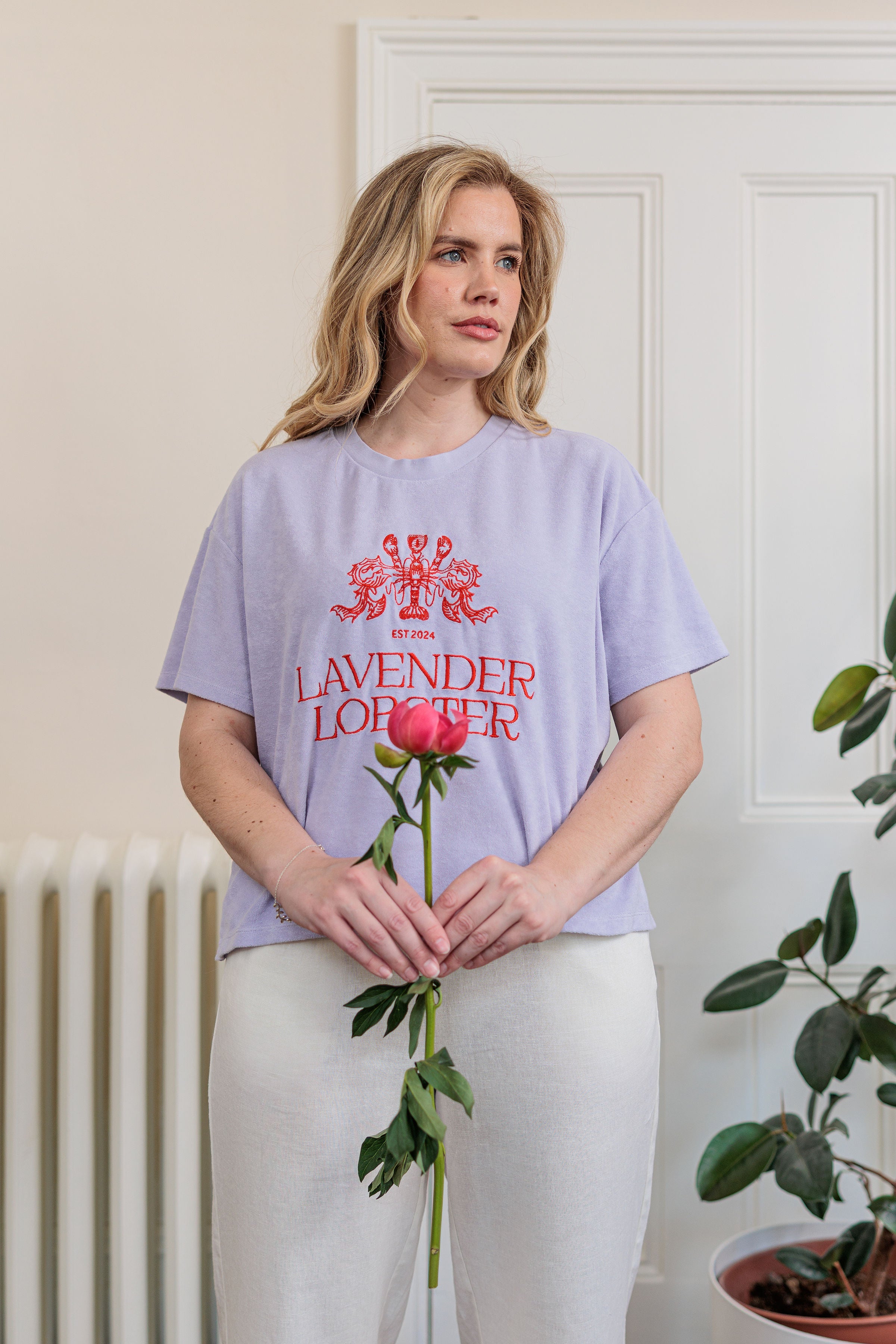 The Clubhouse Tee in organic combed cotton towelling with crest embroidery, detail view
