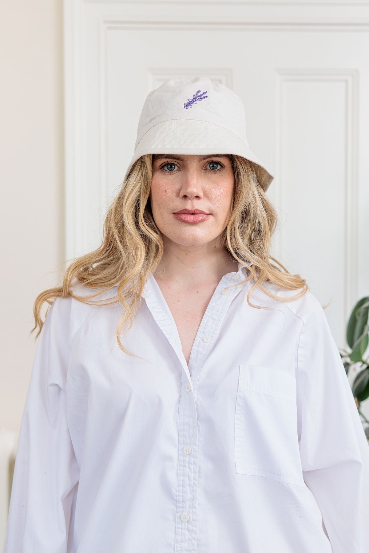 The Lavender Bouquet Bucket Hat with embroidered lavender bouquet detail, front view