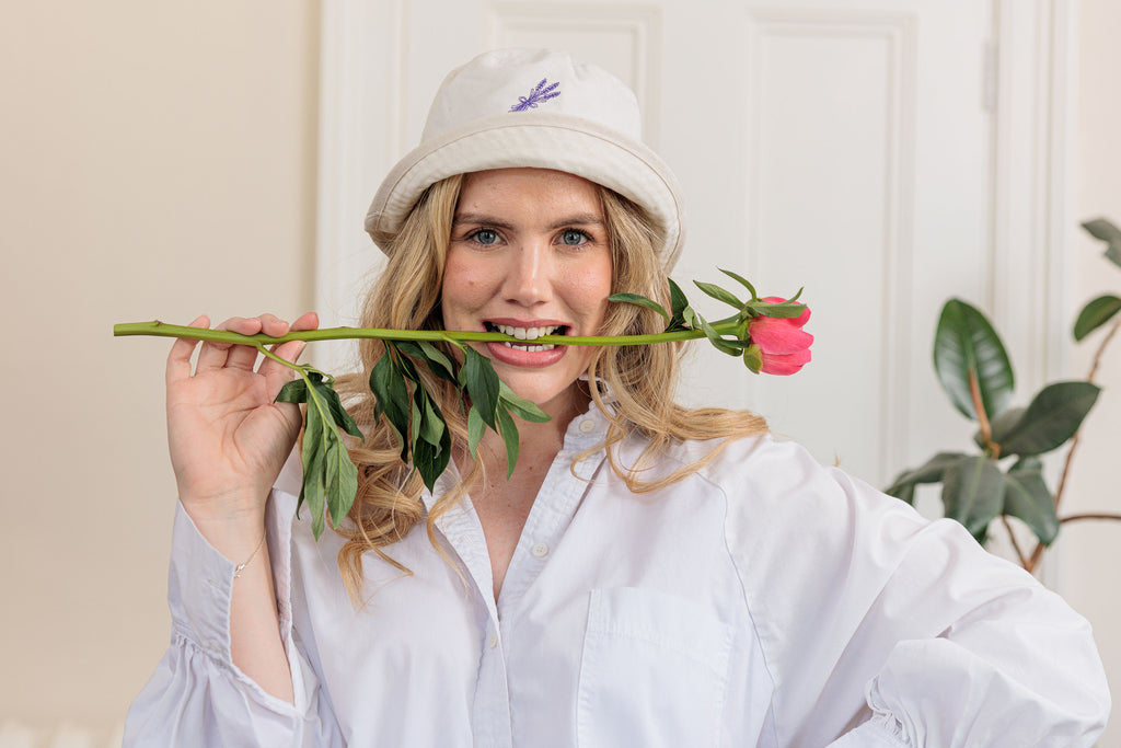 The Lavender Bouquet Bucket Hat with embroidered lavender bouquet detail, additional angle