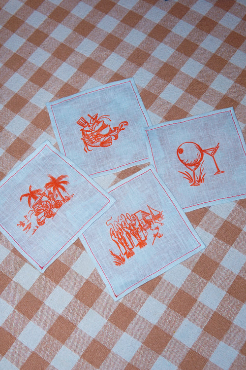 Clubhouse Cocktail Napkins, set of 4 in flax linen printed with yacht club scenes